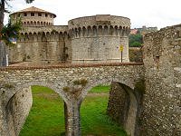 Sarzana's citadel with the Fortress of Sarzanello on the hill in the background