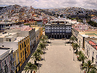 A view from Catedral de Santa Ana shows the colorful residential areas of Las Palmas climbing up the mountains.