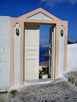 Doorway to a cliffside restaurant in Fira.