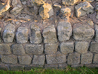 Tooling marks are evident in some of the wall stones