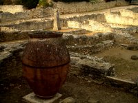 An unearthed urn among the ruins of Roman houses in one of the excavated districts.