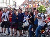 The Scottish fans came to Germany but their team stayed home.
