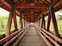 The multiple Kingpost truss system was an early covered bridge design.