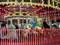 One of the few remaining antique wooden carousels in the US.